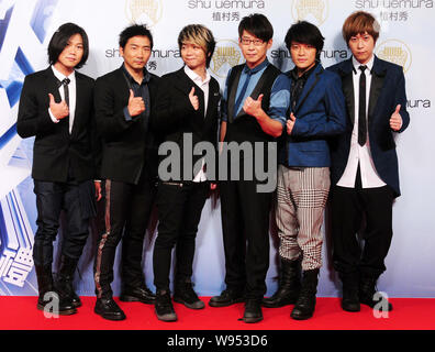 Taiwanese rock band Mayday poses on the red carpet prior to the 23rd Golden Melody Awards ceremony in Taipei, Taiwan, 23 June 2012. Stock Photo