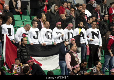 Jordanian soccer fans show support for their team during a Group A match of the 2014 World Cup qualifier between China and Jordan in Guangzhou city, s Stock Photo