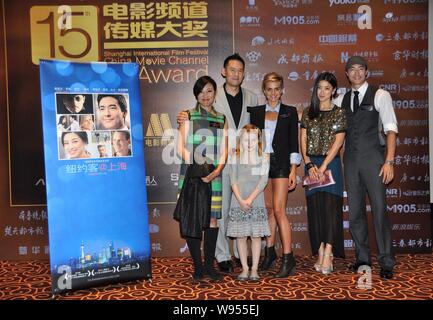(From right) South Korean actor Daniel Henny, Chinese actress and host Zhu Zhu, American actress Eliza Coupe pose at the press conference for their ne Stock Photo