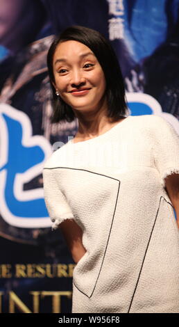 Chinese actress Zhou Xun smiles during the fan meeting after the premiere of her new movie, Painted Skin II, in Beijing, China, 28 June 2012. Stock Photo