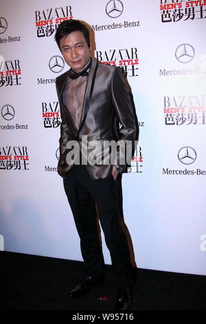 Hong Kong singer and actor Gallen Lo poses as he arrives for the award ceremony by the Bazaar Mens Style magazine in Beijing, China, 3 November 2012. Stock Photo