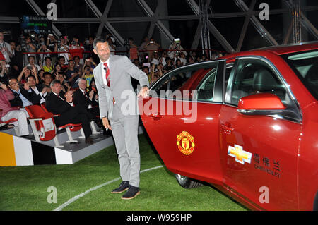 Welsh soccer player Ryan Giggs of Manchester United arrives for a promotional event of Manchester United and Chevrolet in Shanghai, China, 31 May 2012 Stock Photo