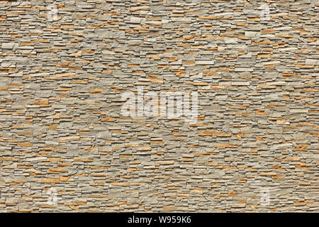 Beige stone blocks wall texture background structure Stock Photo