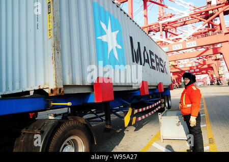 A container terminal at Qingdao Port in east China's Shandong Province ...