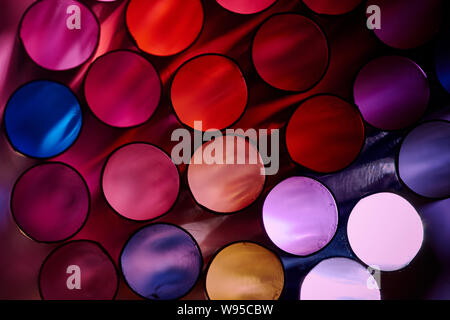 Abstract macro shot of colorful drinking straws, backlit and full frame. Stock Photo
