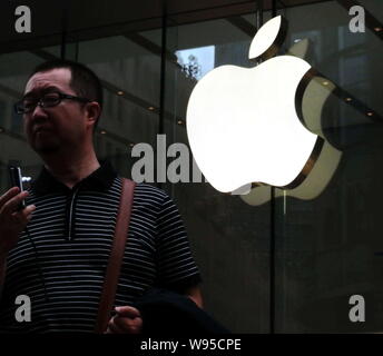 FILE - The logo of Chinese technology firm Alibaba is seen at its ...