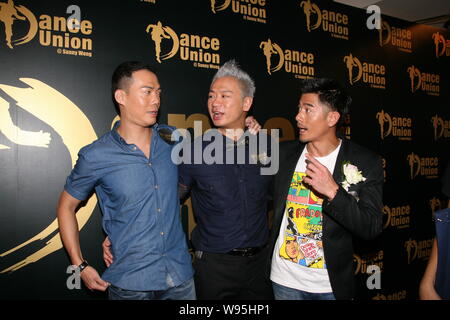 Hong Kong singer and actor Aaron Kwok (R) chats with actor Michael Tse (L), also known as Laughing, at the opening ceremony of Dance Union in Hong Kon Stock Photo