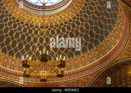 Beautiful golden interior view of Spanish Synagogue influenced by moorish interior design in Alhambra at Jewish Town in Prague, Czech Republic. Stock Photo