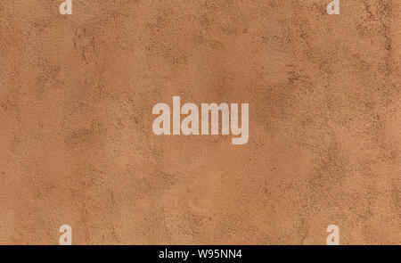 Wall plastered and painted background texture. Exterior building wall facade brown color blank empty, copy space Stock Photo
