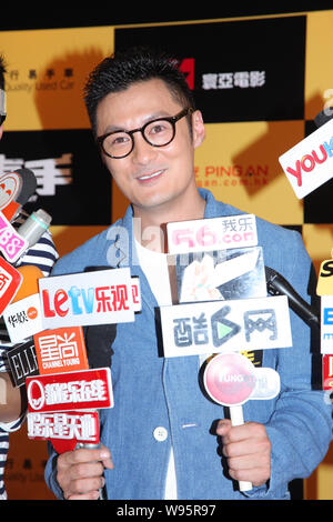 Hong Kong actor Shawn Yue is interviewed during the premiere for his new movie, Motorway, in Hong Kong, China, 18 June 2012. Stock Photo