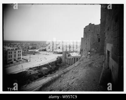 Aleppo from the castle showing moat & entrance Stock Photo