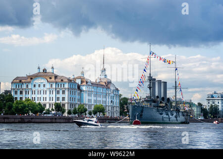 The Russian Cruiser Aurora festooned with flags on the River Neva in St Petersburg, Russia on 23 July 2019 Stock Photo