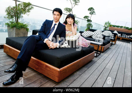 Chinese actress Zhang Ziyi, right, poses with Taiwanese singer and actor Leehom Wang for photographers during the photocall for the film, My Lucky Sta Stock Photo