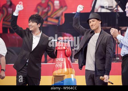 Chinese pianist Lang Lang, left, and Hong Kong singer Jacky Cheung, second right, celebrate during a ceremony by Coca-Cola to release an Olympic theme Stock Photo