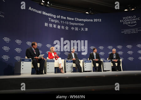 (From left) Jeffrey (Jeff) Joerres, President and CEO of Manpower Inc., Danish Prime Minister Helle Thorning-Schmidt, Zhu Min, deputy managing directo Stock Photo