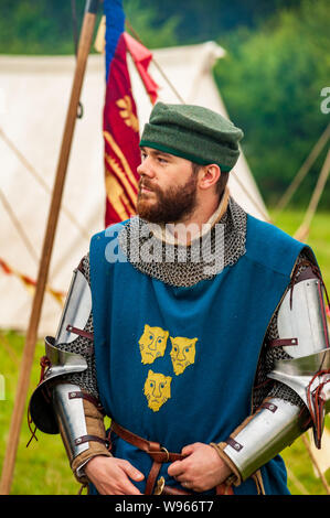 Re-enactors stage the Battle of Shrewsbury 1403 on the original battlefield in July 2019 portrait of armoured man or knight Stock Photo