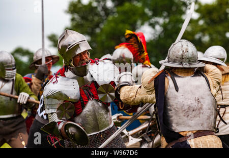 Re-enactors stage the Battle of Shrewsbury 1403 on the original battlefield in July 2019 Stock Photo