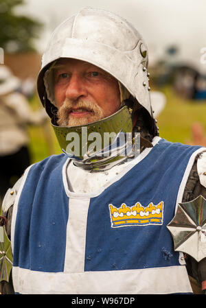 Re-enactors stage the Battle of Shrewsbury 1403 on the original battlefield in July 2019 portrait of armoured man or knight Stock Photo