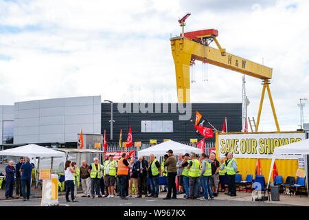 Workers protest against the proposed closure of Harland and Wolff, the famous Belfast shipyard where the RMS Titanic was built Stock Photo