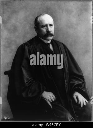Alton Brooks Parker, 1852-1926, three quarters length portrait, seated, facing right wearing judicial robes Stock Photo