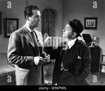 FRED MacMurray and EDWARD G. ROBINSON in DOUBLE INDEMNITY 1944 director Billy Wilder screenplay Billy Wilder and Raymond Chandler novel James M. Cain Paramount Pictures Stock Photo