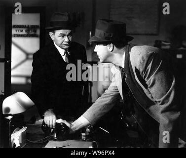 EDWARD G. ROBINSON and FRED MacMURRAY in DOUBLE INDEMNITY 1944 director Billy Wilder screenplay Billy Wilder and Raymond Chandler novel James M. Cain Paramount Pictures Stock Photo