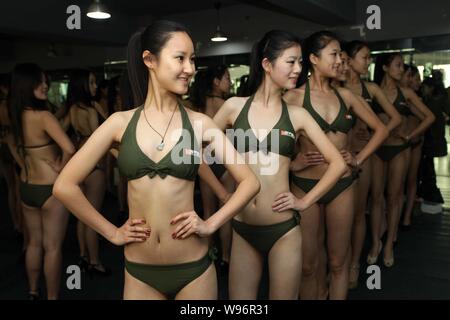 Bikini-dressed Chinese female high school students take part in a