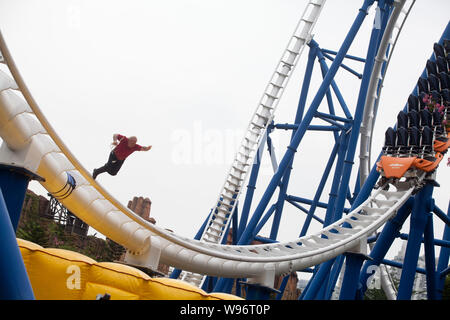 Canadian escapologist Dean Gunnarson jumps off the track of the