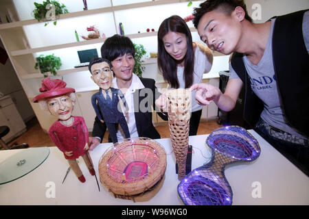 Chinese Hairstylist Huang Xin Left Displays His Hair Made