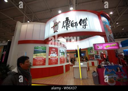 --File--View of the stand of Tingyi during a fair in Beijing, China, 26 November 2011.   Tingyi (Cayman Islands) Holding Corp, Chinas biggest maker of Stock Photo
