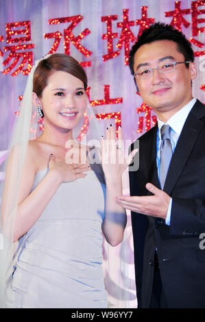 Taiwanese singer Rainie Yang Cheng Lin poses at a press conference to ...