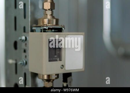 Analog device regulator for efficient automated heating system. Stock Photo