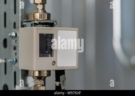 Analog device regulator for efficient automated heating system. Stock Photo