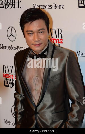 Hong Kong singer and actor Gallen Lo poses as he arrives for the award ceremony by the Bazaar Mens Style magazine in Beijing, China, 3 November 2012. Stock Photo