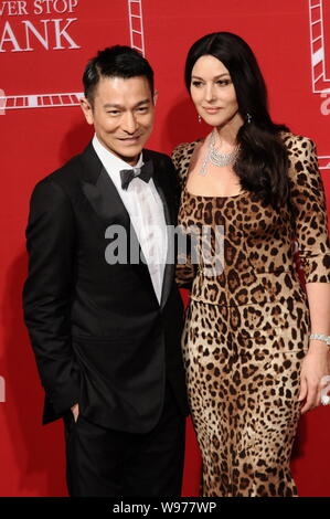 Italian actress Monica Bullucci poses with Hong Kong actor Andy