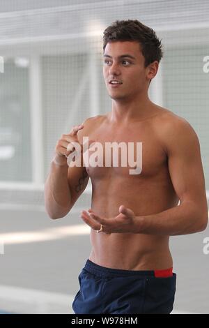 Olympic diving bronze medalist Thomas Daley of Britain gestures during a training and demonstration session to coach young Chinese and British diving Stock Photo
