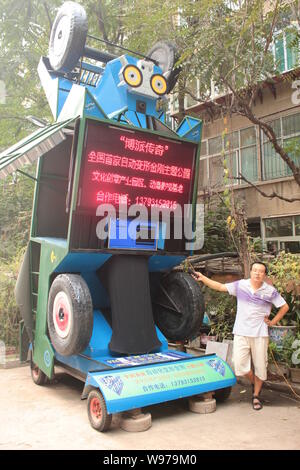 Liu Qingbo is pictured before the Transformer he created which turns ...