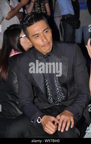 Chinese model Hu Bin attends the opening ceremony for the Louis Vuitton  Maison in Shanghai, China, 18 July 2012 Stock Photo - Alamy