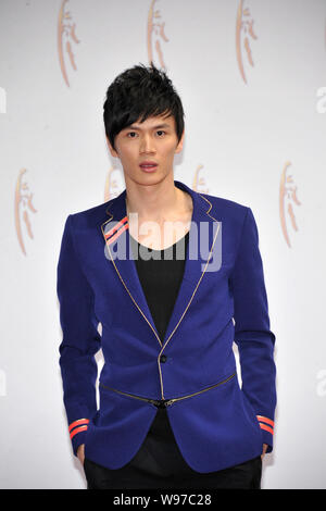 Chinese badminton player Bao Chunlai poses on the red carpet before the 2011 CCTV Sports Personality Award Ceremony in Beijing, China, 15 January 2012 Stock Photo