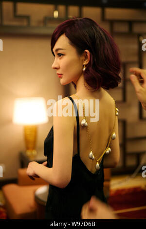Chinese actress Huo Siyan poses during a fashion awards ceremony in Beijing, China, 5 January 2012. Stock Photo