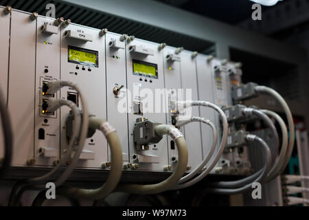 Industrial PLC system in a rack. Selective focus. Stock Photo