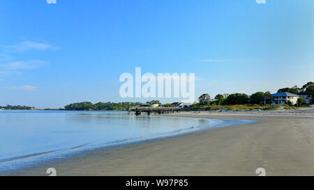 Early morning at the south end of Tybee Island beach. A view of the dunes on the south end of the island Stock Photo