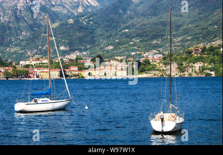 boats in the lake water in Lecco. Parked yachts and boats on lake Como Stock Photo