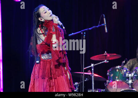 Chinese singer Sa Dingding performs at the Booey Lehoo concert in Beijing, China, 17 December 2011.   The Booey Lehoo concert was held on Saturday (17 Stock Photo