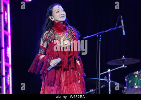 Chinese singer Sa Dingding performs at the Booey Lehoo concert in Beijing, China, 17 December 2011.   The Booey Lehoo concert was held on Saturday (17 Stock Photo