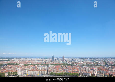 Aerial panoramic view of Lyon with the skyline of Lyon skyscrapers visible in background and Saone river in the foregroud, with the narrow streets of Stock Photo