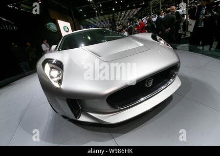 The Jaguar C-X75 Concept is seen on display at the 14th Shanghai International Automobile Industry Exhibition, known as Auto Shanghai 2011, at the Sha Stock Photo