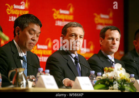 (From left) Fan Xiping, Chairman of Shanghai Shendi Group Co., Robert A. Iger (Bob Iger), left, President and CEO of The Walt Disney Company, and Thom Stock Photo