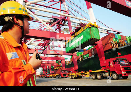 A container terminal at Qingdao Port in east China's Shandong Province ...