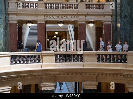 Wisconsin State Capitol, Madison, WI USA. Aug 2018. Visitors enjoying historical displays and exotic artwork inside the Capitol building. Stock Photo